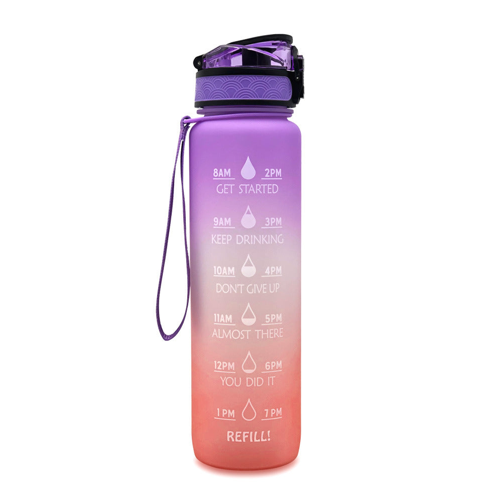 Gradient purple to pink 1L Tritan bottle on a white background