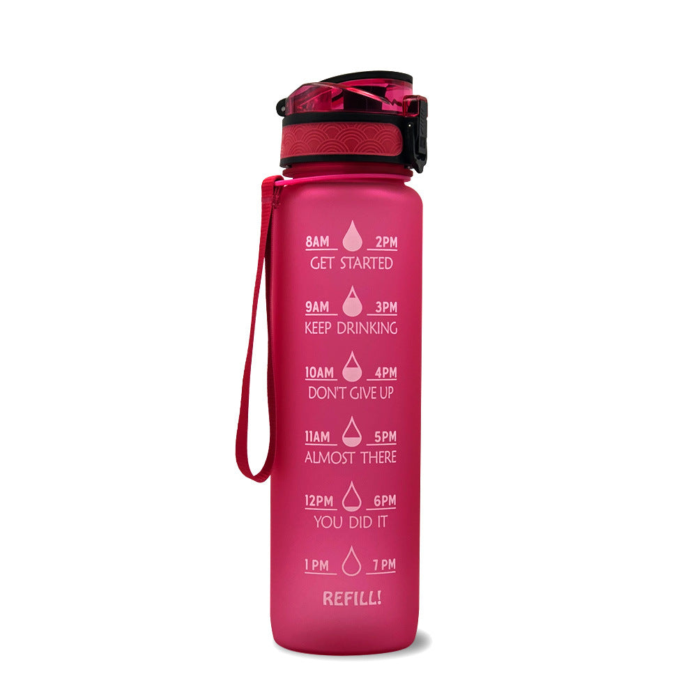Red 1L Tritan bottle on a white background