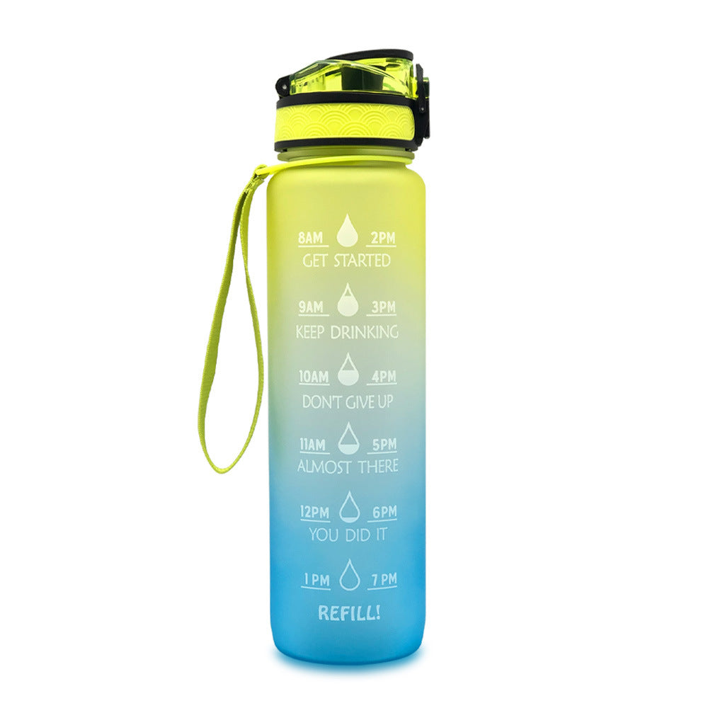 Blue and yellow 1L Tritan bottle on a white background