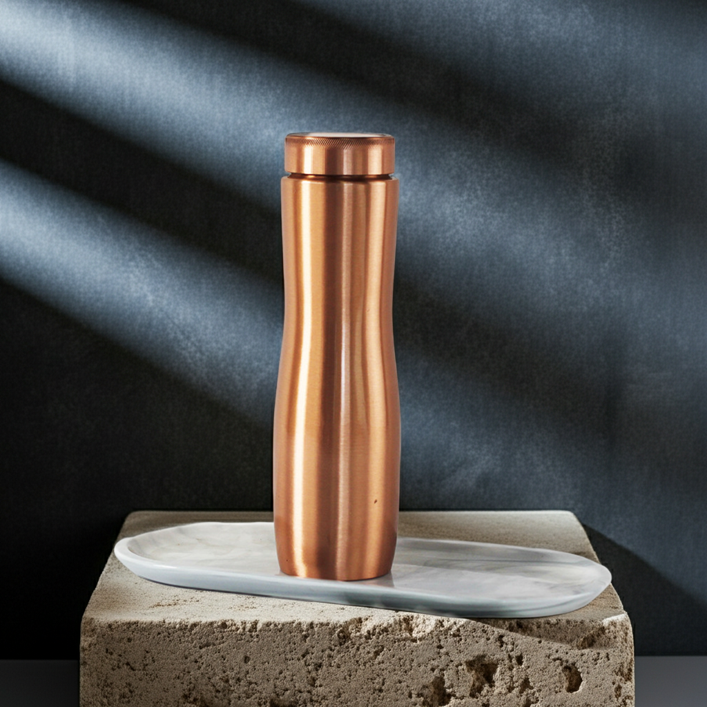 Handmade Brass Water Bottle Gold Hourglass on a stone block