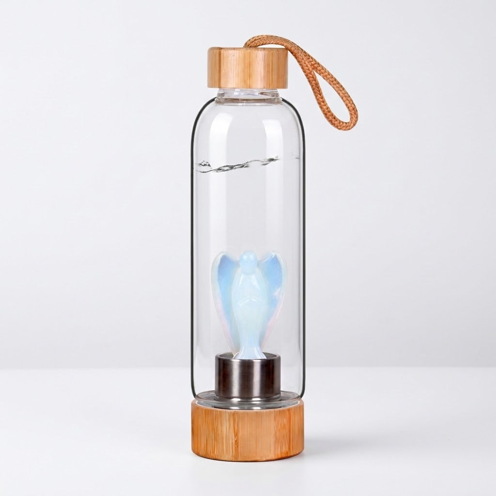 CrystalAura 550ml Gemstone Glass Water Bottle on a white wall background