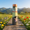 Sowpeace Serene Meadow Copper Bottle on a wooden walkway in a meadow